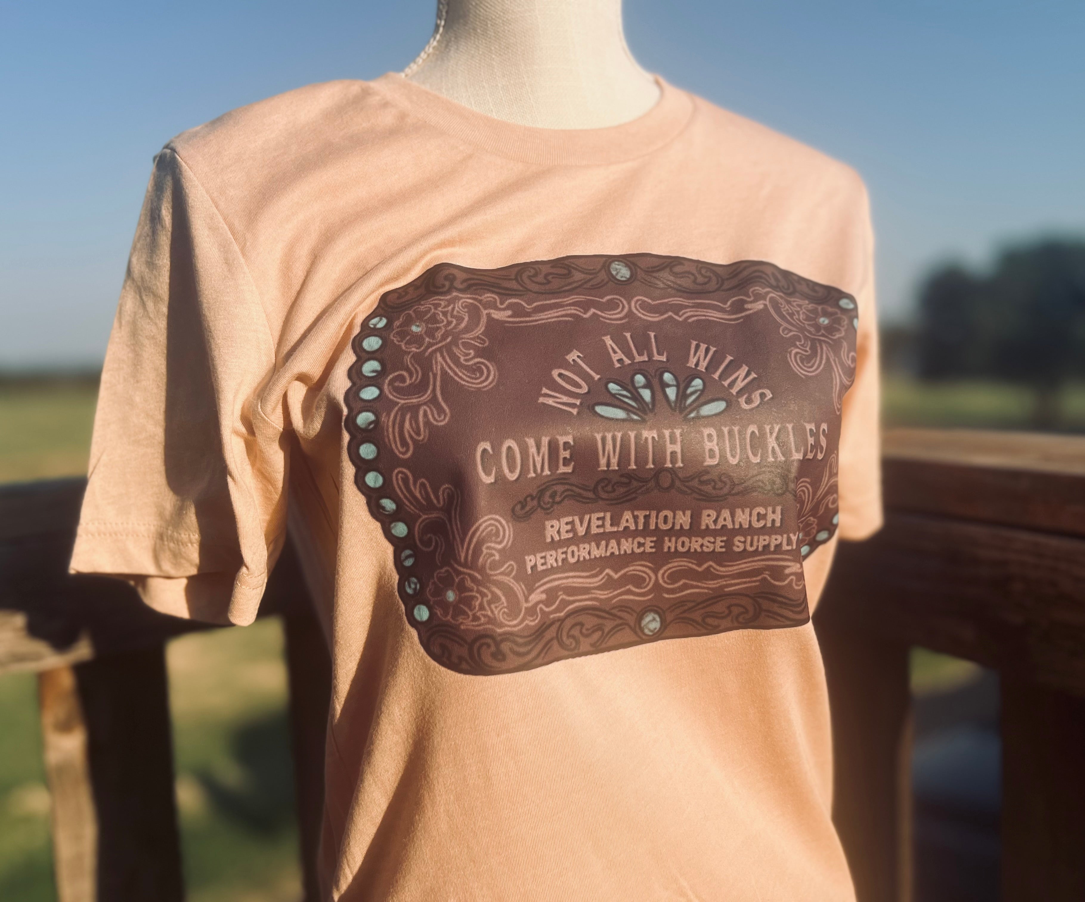 Not All Wins Come With Buckles Tee